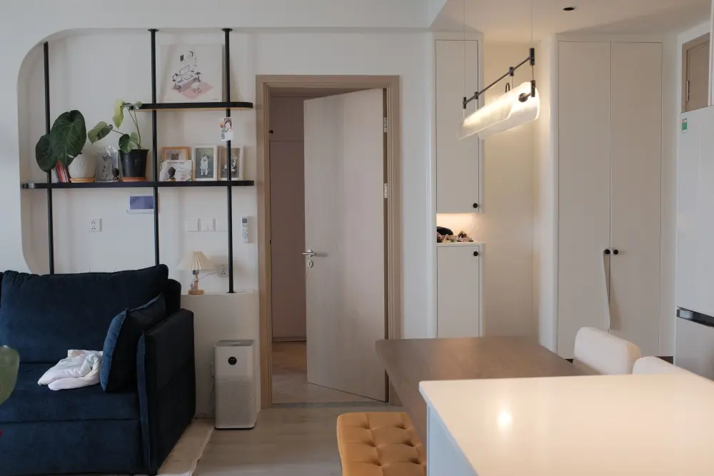Modern apartment living room and kitchen in the evening